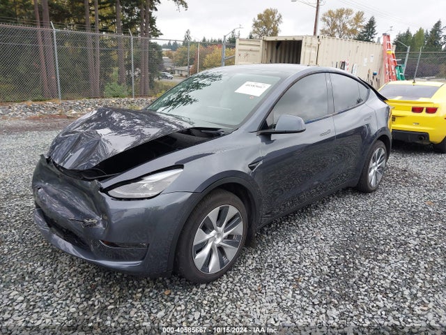 2023 TESLA MODEL Y 7SAYGDEE1PF645877 Photo 1