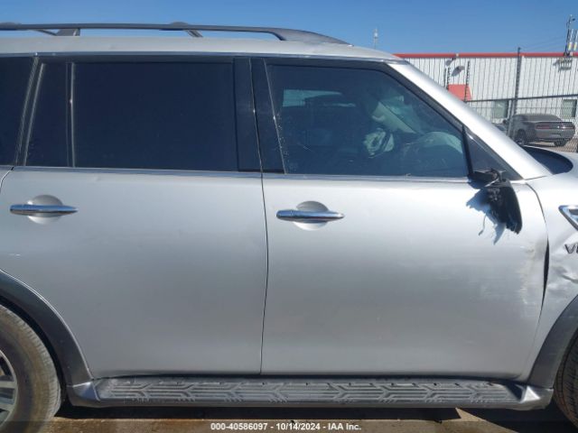 JN8AY2ND4KX009609 Nissan Armada Sl