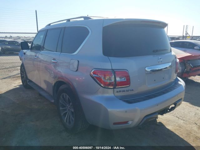 JN8AY2ND4KX009609 Nissan Armada Sl