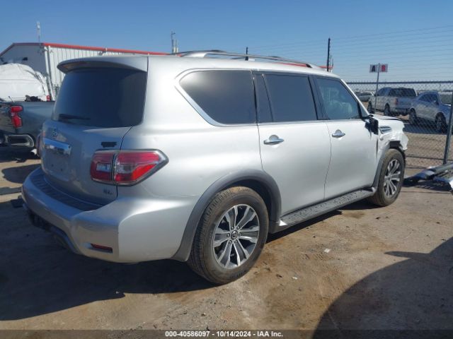 JN8AY2ND4KX009609 Nissan Armada Sl