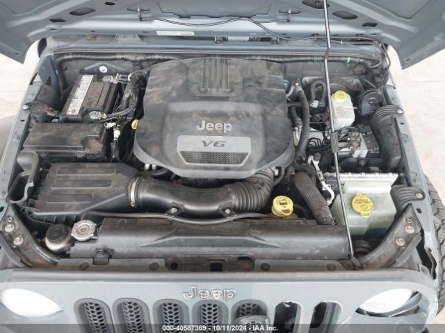 1C4HJWDG1EL227701 Jeep Wrangler Unlimited Sport