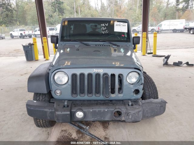 1C4HJWDG1EL227701 Jeep Wrangler Unlimited Sport