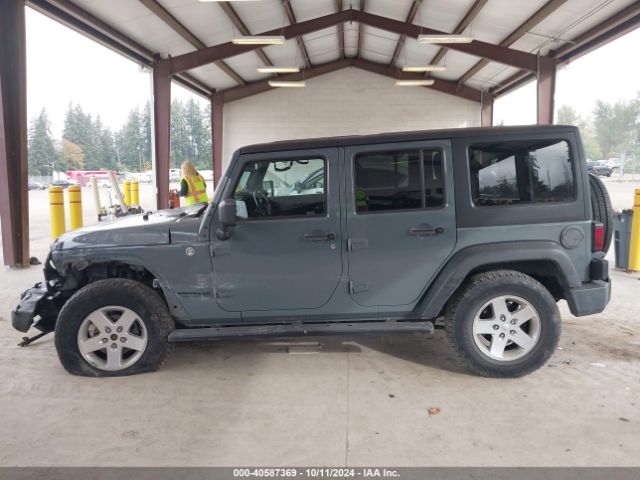 1C4HJWDG1EL227701 Jeep Wrangler Unlimited Sport