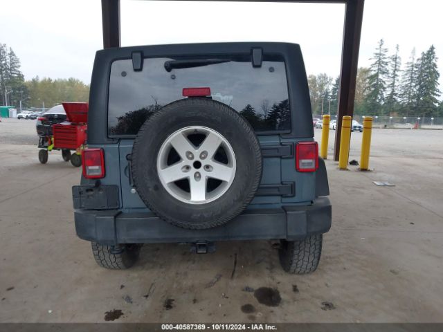 1C4HJWDG1EL227701 Jeep Wrangler Unlimited Sport