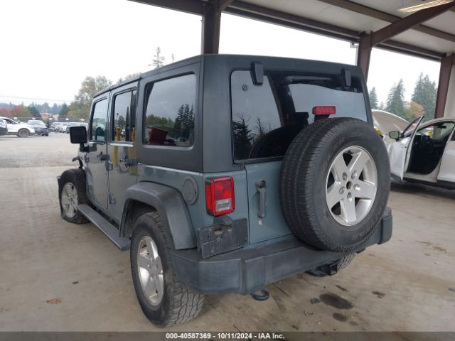 1C4HJWDG1EL227701 Jeep Wrangler Unlimited Sport