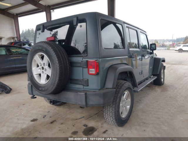 1C4HJWDG1EL227701 Jeep Wrangler Unlimited Sport