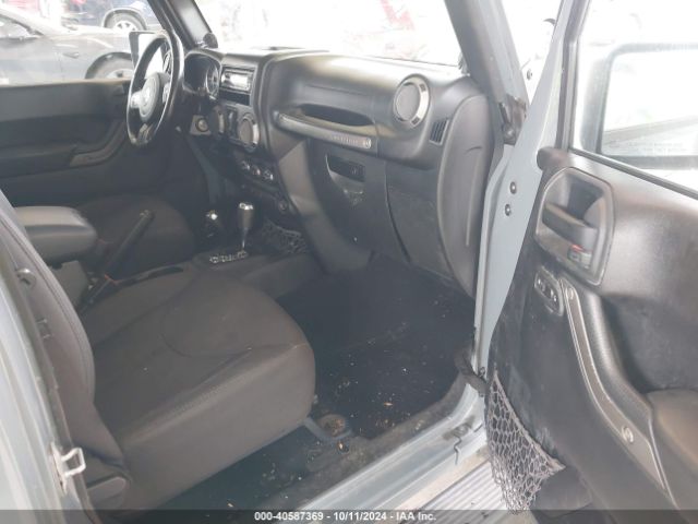 1C4HJWDG1EL227701 Jeep Wrangler Unlimited Sport