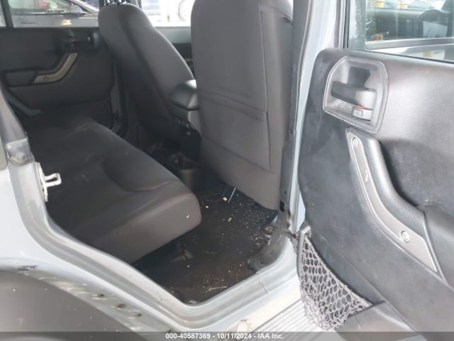 1C4HJWDG1EL227701 Jeep Wrangler Unlimited Sport
