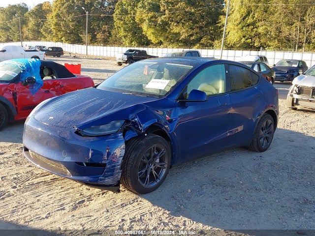 2024 TESLA MODEL Y 7SAYGDEDXRA323777 Photo 1