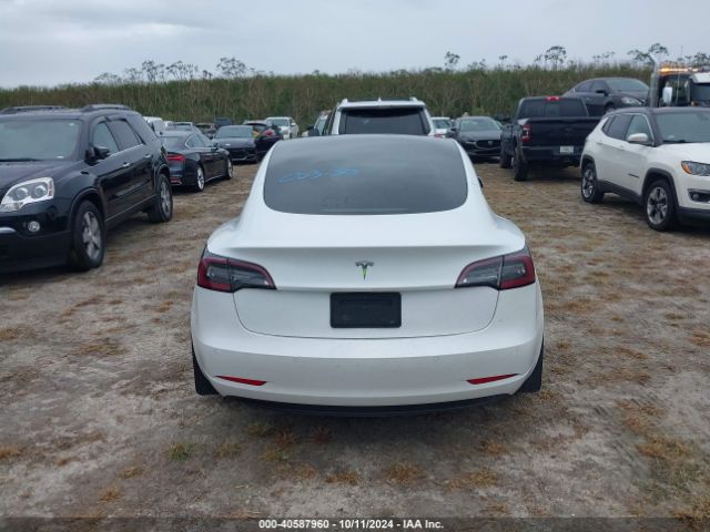 5YJ3E1EA6MF852477 Tesla Model 3 Standard Range Plus Rear-wheel Drive