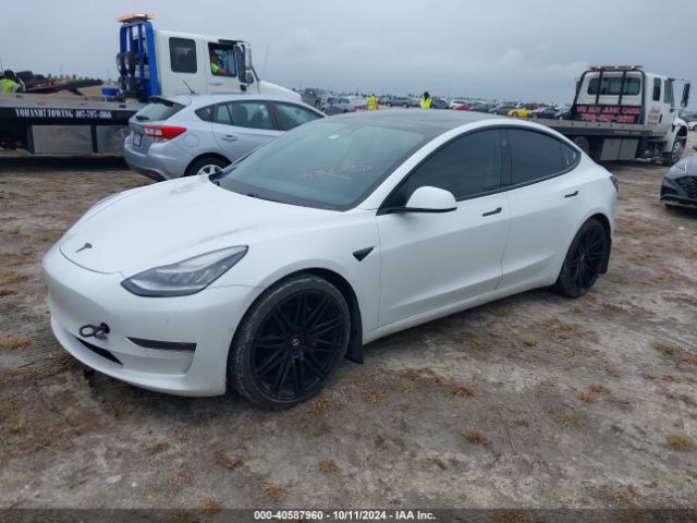 5YJ3E1EA6MF852477 Tesla Model 3 Standard Range Plus Rear-wheel Drive