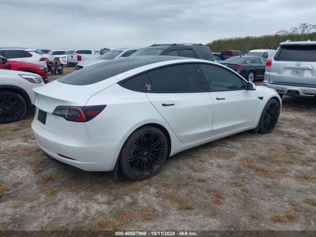 5YJ3E1EA6MF852477 Tesla Model 3 Standard Range Plus Rear-wheel Drive