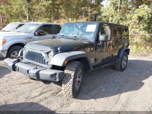 1C4BJWDGXEL251517 Jeep Wrangler Unlimited Sport