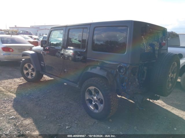 1C4BJWDGXEL251517 Jeep Wrangler Unlimited Sport