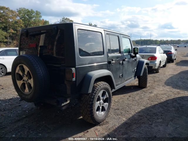 1C4BJWDGXEL251517 Jeep Wrangler Unlimited Sport