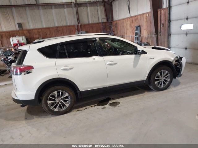 JTMRJREV2GD030911 Toyota Rav4 Hybrid Xle