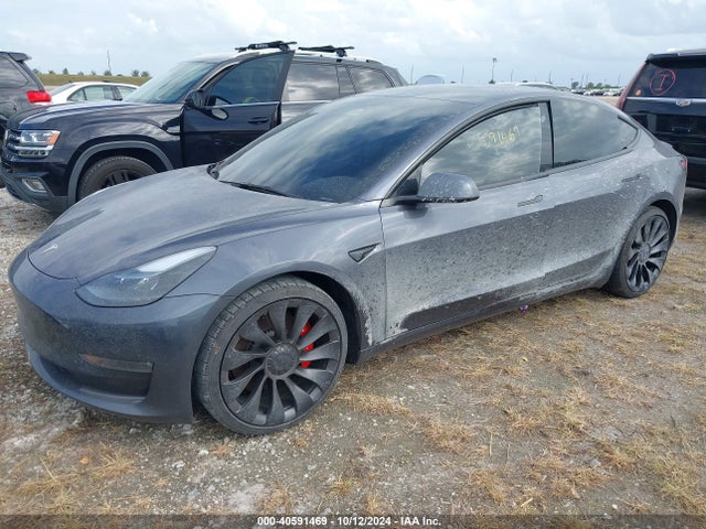 2023 TESLA MODEL 3 5YJ3E1ECXPF668892 Photo 1
