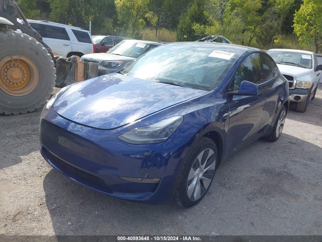 2023 TESLA MODEL Y 7SAYGDEE4PF806190 Photo 1