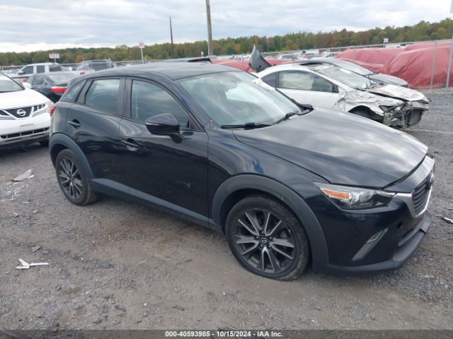 JM1DKFC72H0169584 Mazda Cx-3 Touring