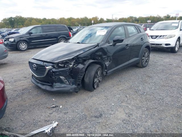 JM1DKFC72H0169584 Mazda Cx-3 Touring