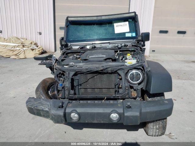 1C4HJWDG1GL311391 Jeep Wrangler Unlimited Sport