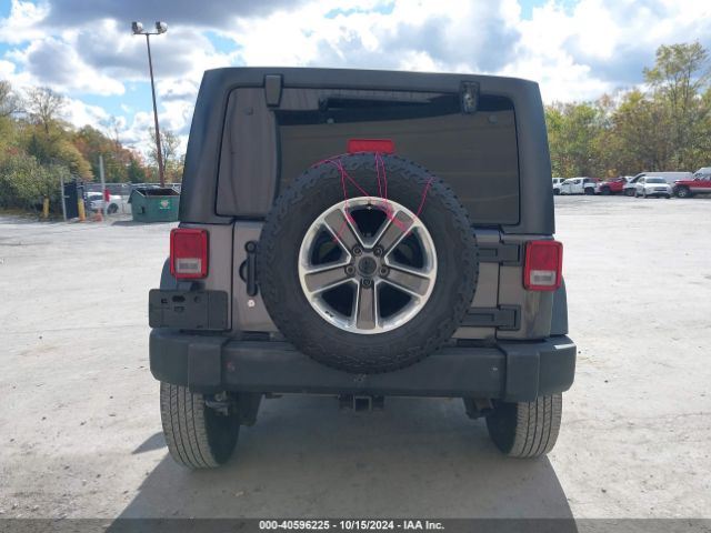 1C4HJWDG1GL311391 Jeep Wrangler Unlimited Sport