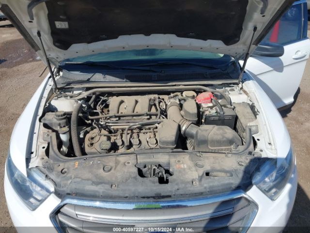 1FAHP2E84GG102031 Ford TAURUS SEL