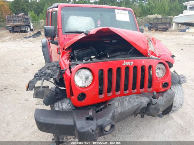 1C4BJWDG8GL265452 Jeep Wrangler Unlimited Sport