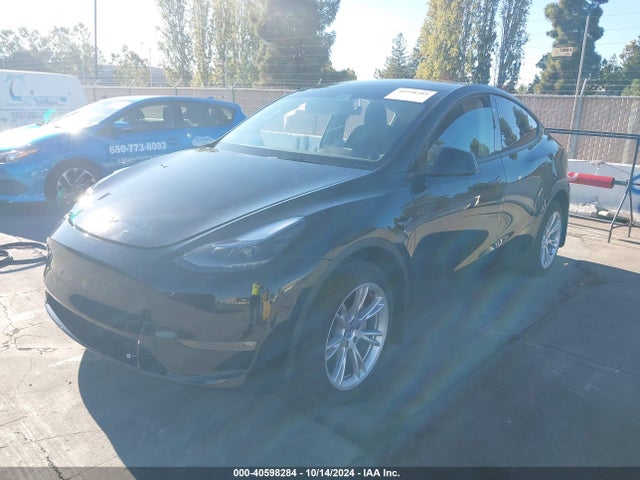 2024 TESLA MODEL Y 7SAYGDEE5RF982457 Photo 1