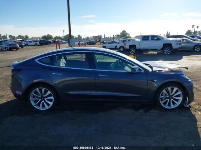 5YJ3E1EB4JF185042 Tesla Model 3 Long Range/performance