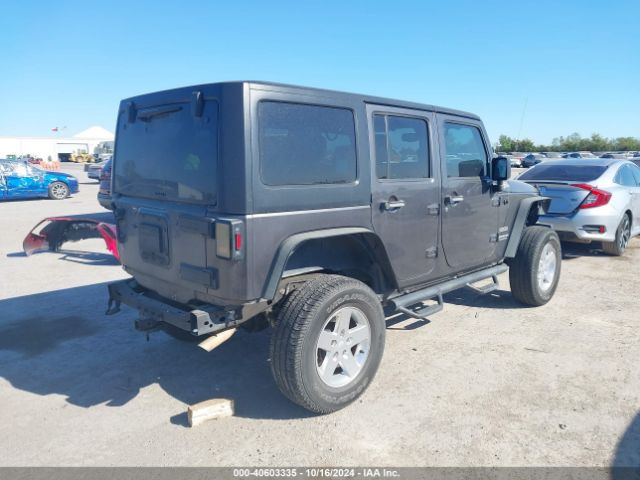1C4BJWDG5GL167396 Jeep Wrangler Unlimited Sport