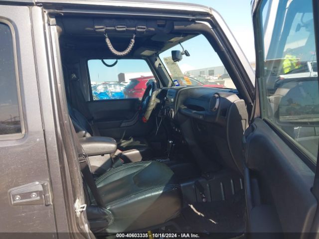 1C4BJWDG5GL167396 Jeep Wrangler Unlimited Sport