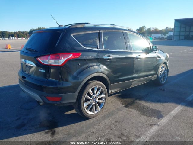 1FMCU0GX9EUE37219 Ford ESCAPE SE