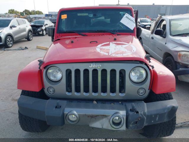 1C4BJWDG3EL199535 Jeep Wrangler Unlimited Freedom Edition