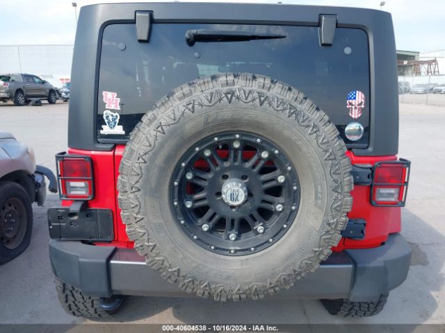 1C4BJWDG3EL199535 Jeep Wrangler Unlimited Freedom Edition