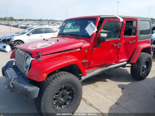1C4BJWDG3EL199535 Jeep Wrangler Unlimited Freedom Edition
