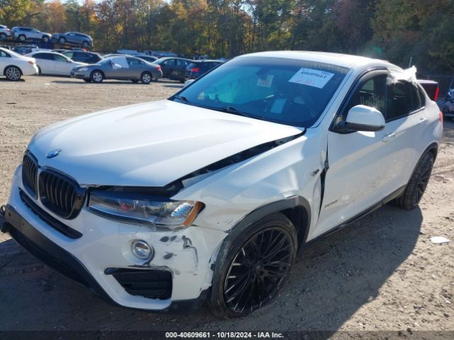2015 BMW X4 5UXXW3C50F0M86581 Photo 1