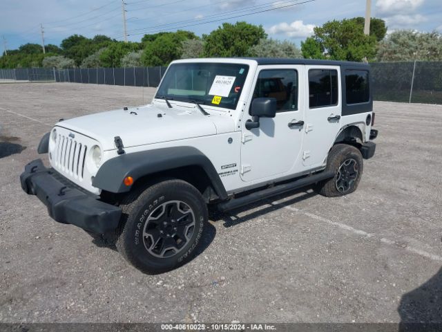 1C4BJWDG2EL155011 Jeep Wrangler Unlimited Sport