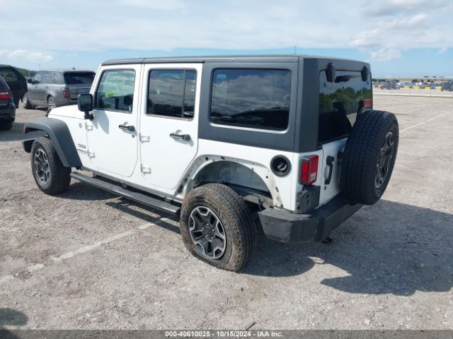 1C4BJWDG2EL155011 Jeep Wrangler Unlimited Sport