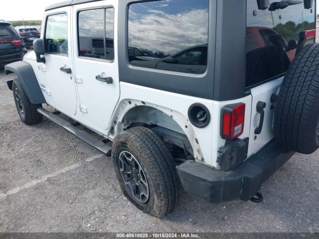 1C4BJWDG2EL155011 Jeep Wrangler Unlimited Sport