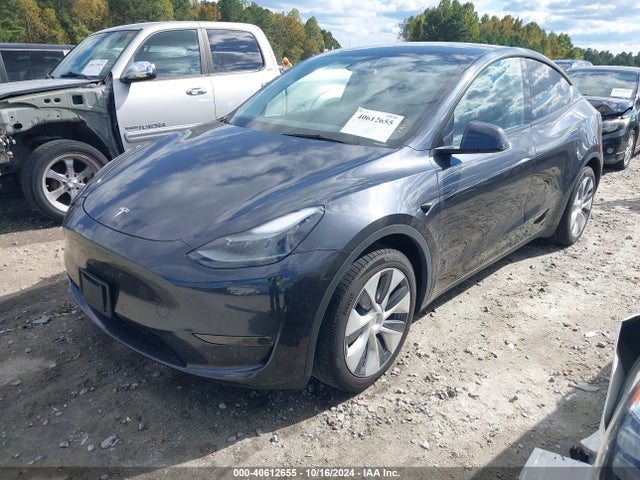 2024 TESLA MODEL Y 7SAYGDEE1RA252350 Photo 1