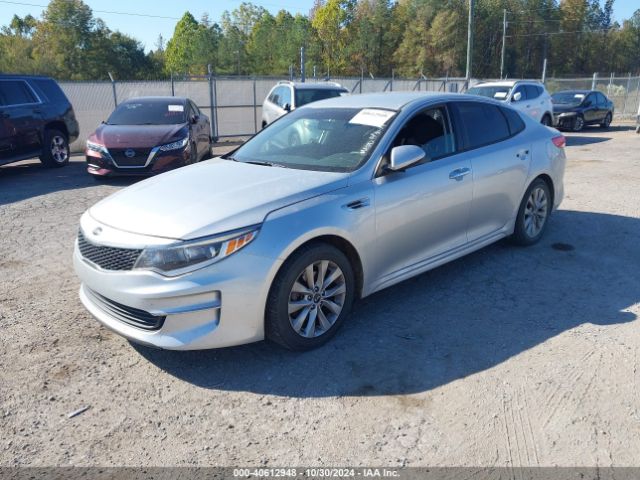 5XXGT4L32GG037594 KIA Optima Lx