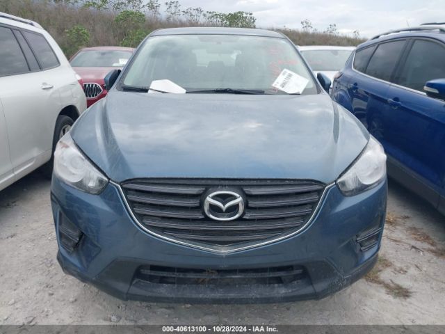 JM3KE2BY9G0867651 Mazda CX-5 SPORT