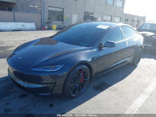 2024 TESLA MODEL 3 5YJ3E1ET1RF856591 Photo 1