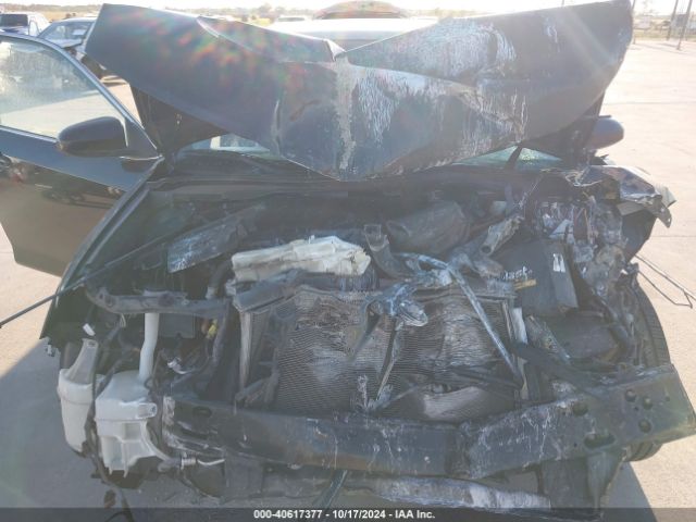 4T1BF1FK2EU828665 Toyota CAMRY SE