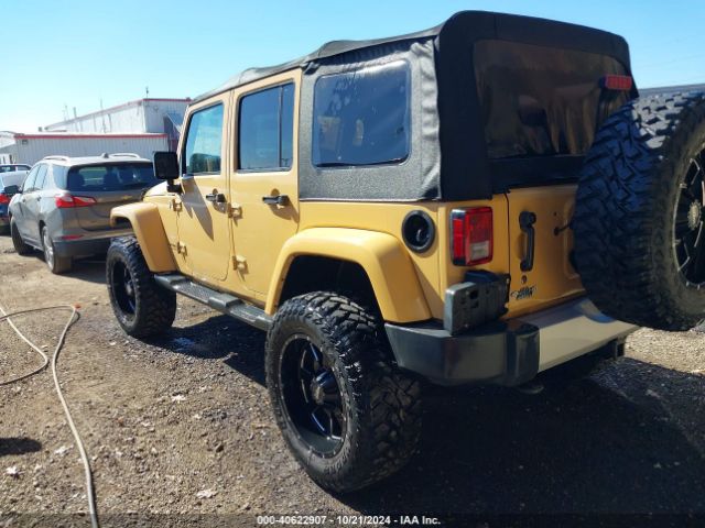 1C4BJWEGXEL149035 Jeep Wrangler Unlimited Sahara