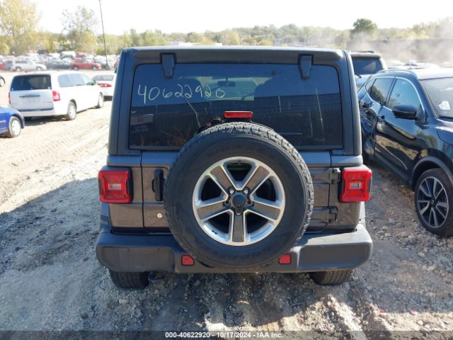 1C4HJXEG5JW115545 Jeep Wrangler Unlimited Sahara 4x4