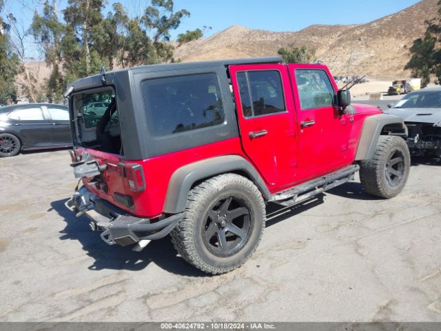 1C4BJWDG3EL190947 Jeep Wrangler Unlimited Sport