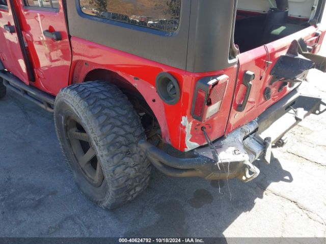 1C4BJWDG3EL190947 Jeep Wrangler Unlimited Sport