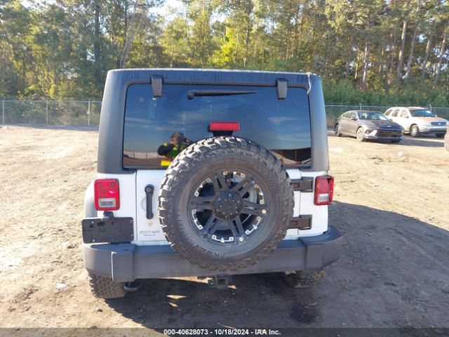 1C4HJWDG8EL113209 Jeep Wrangler Unlimited Sport